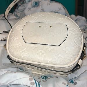 Louis Vuitton engraved small/medium sized purses